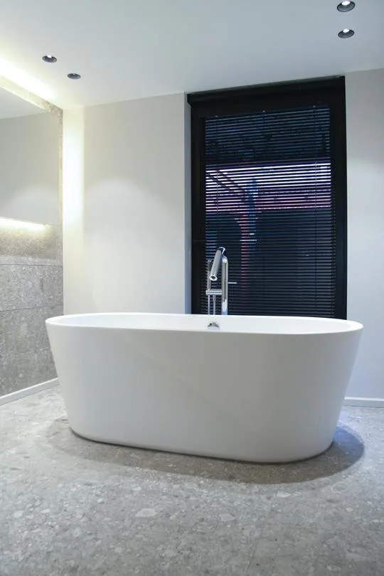 Shower to tub conversion with new mirror and lighting in Port St Lucie